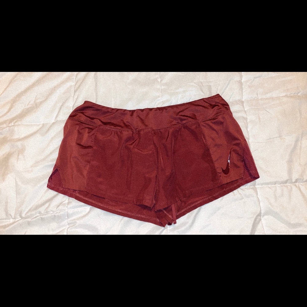 Purple Nike running shorts